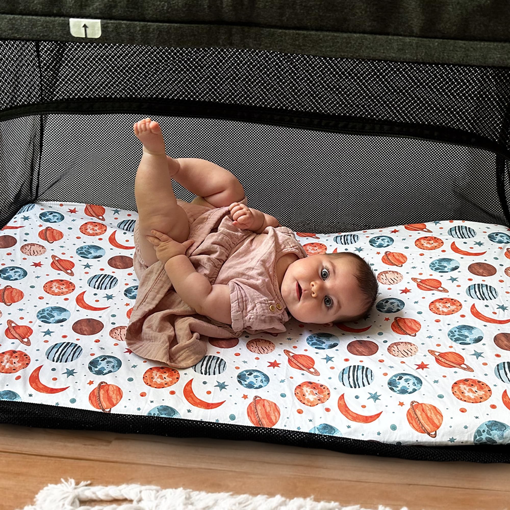 Quiggly machine-washable baby sheets simplify cleanup after spills and overnight wear.