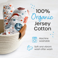 Quiggly travel crib sheets in planet pattern add playful decor while keeping baby cozy.
