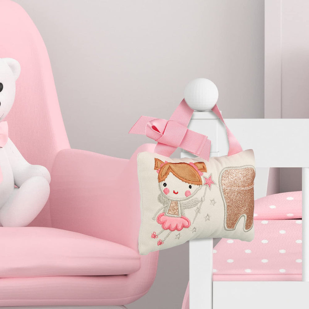 Qunclay tooth fairy pillow showcases embroidered tooth design, a charming room decoration.
