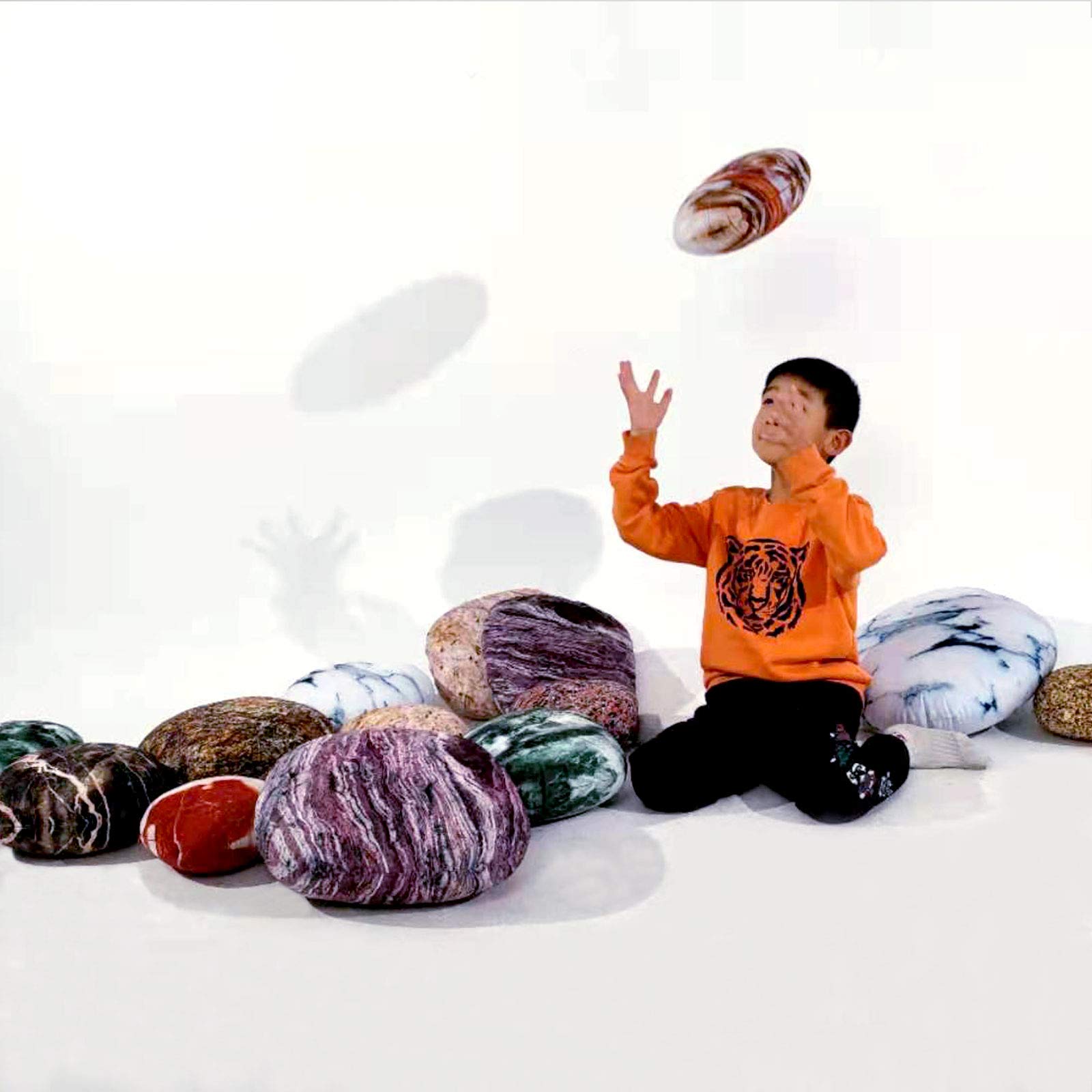 Qupace rock pillows cover decor-room-look on sofa for playful ambience