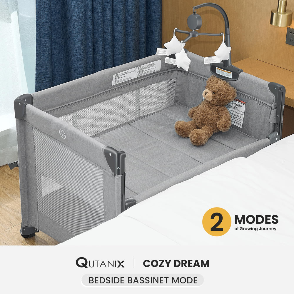QUTANIX co-sleeper with retractable side for easy nighttime access