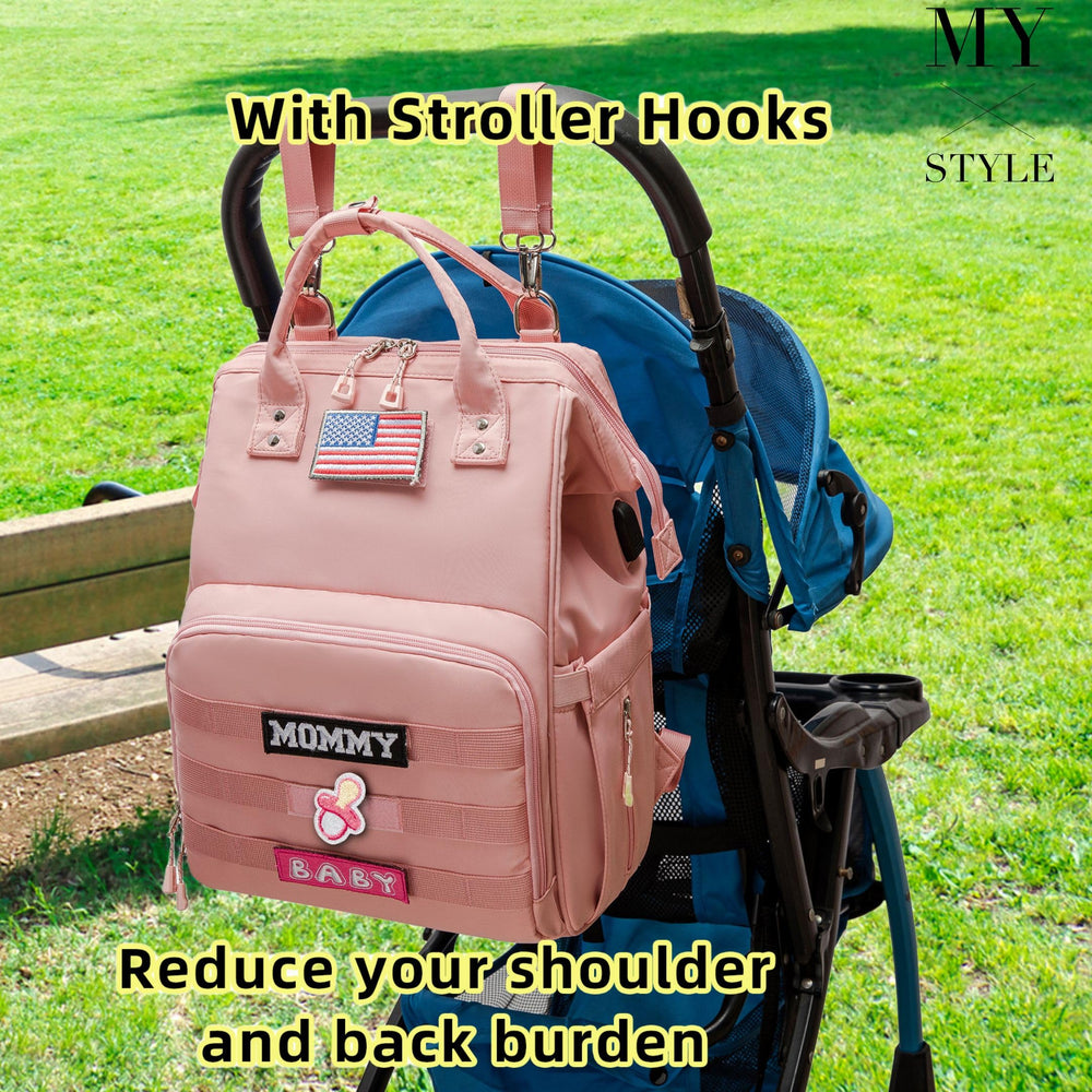 QWREOIA diaper bag backpack patches illustrates customization options.