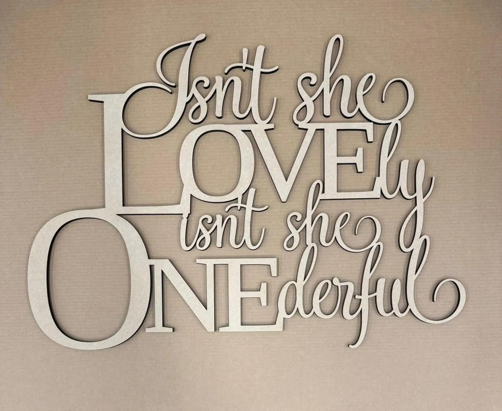 QWTOWFM Isnt She Lovely Onederful Sign used as 1st birthday backdrop for sentimental photos.