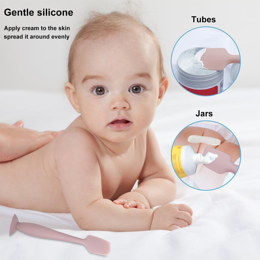 QYG diaper-ointment-spread-evenly spatula distributes cream gently.