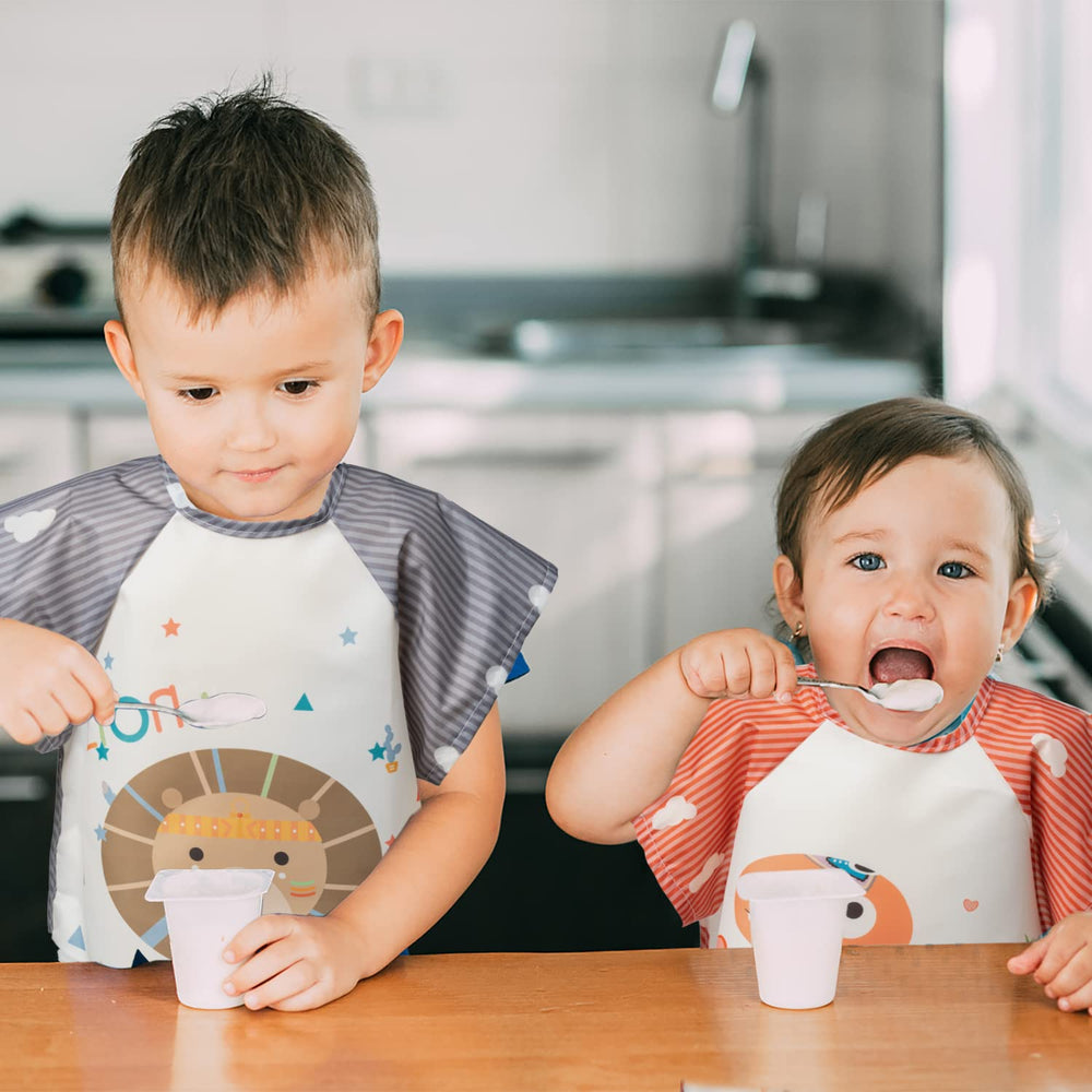 R HORSE blue whale pattern bib adds fun while catching spills.