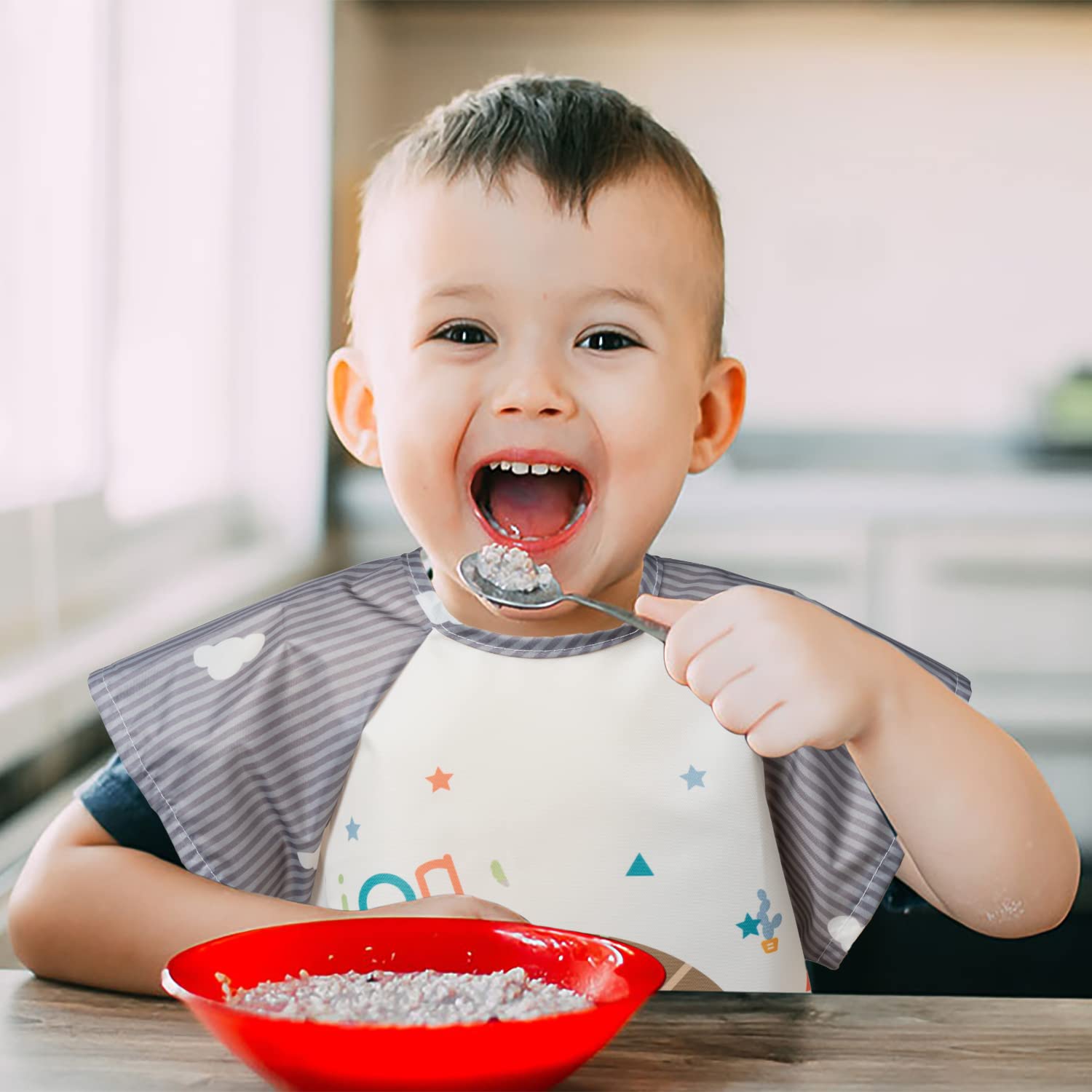 R HORSE deer pattern bib helps contain crumbs and mess.