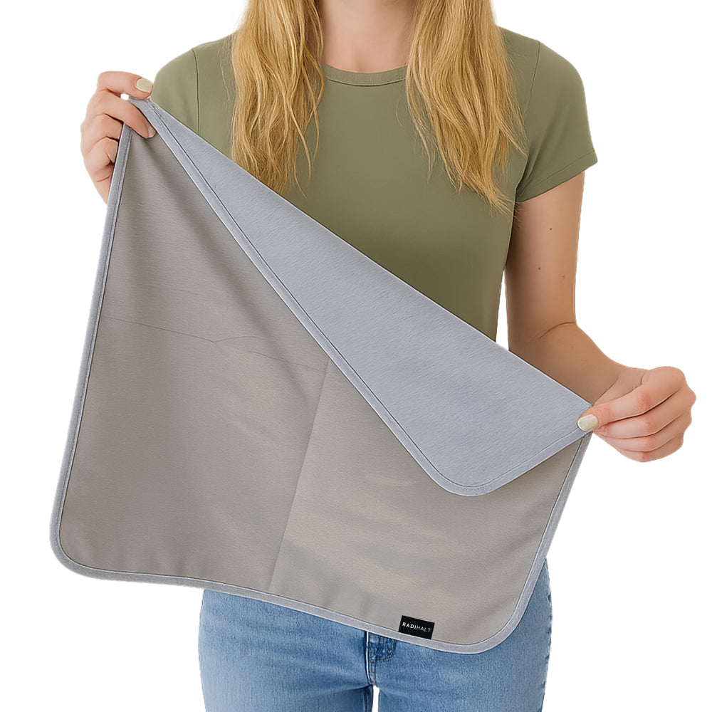 RADIHALT EMF blanket folded on a desk blocks RF radiation discreetly