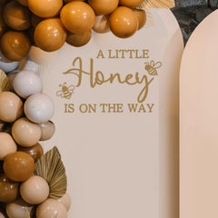 Ramciyo honey bee party sign closeup highlights pink letters and removable vinyl.