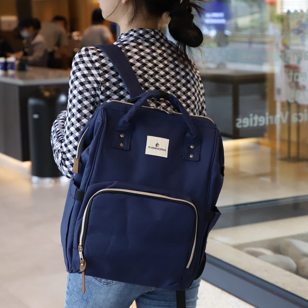 Ramhorn diaper bag backpack blue side pocket, convenient storage for bottles and toys.