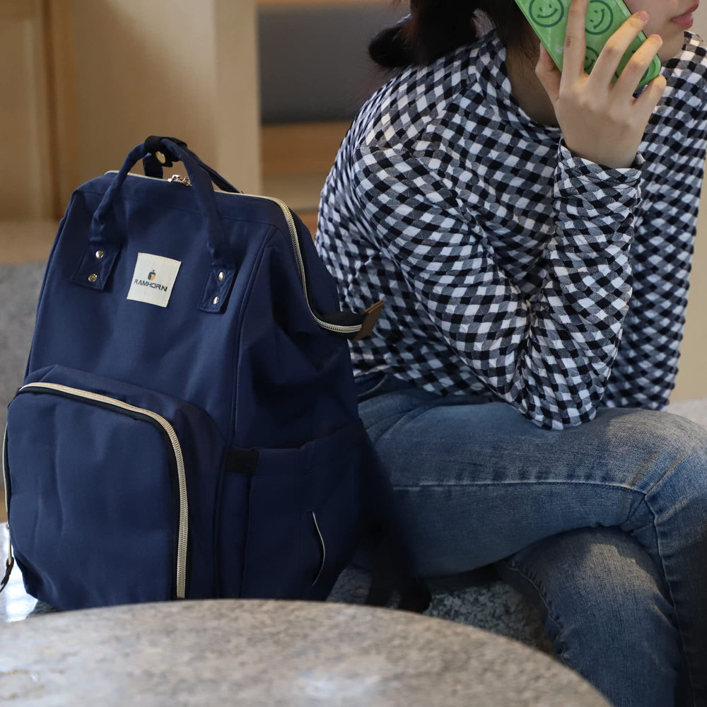 Ramhorn diaper bag backpack open organization, ample compartments keep essentials neatly sorted.