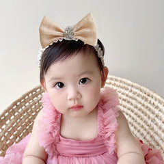 Rannyrena baby bow lace detail keeps hair styled with charm.