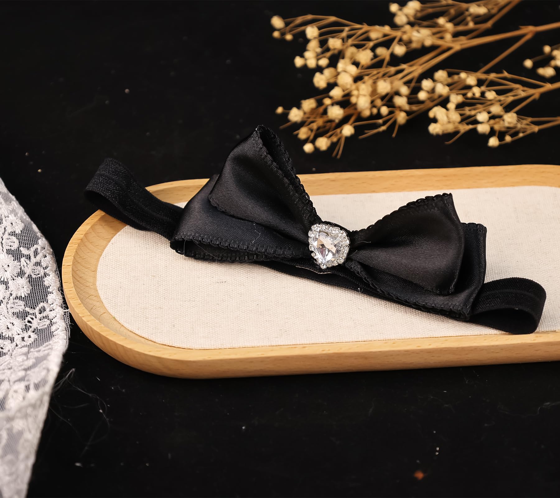 Rannyrena velvet gloss bow headband in pink enhances cute party outfits.