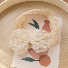 Rannyrena lace headband birthday party wear adds cute, coordinated styling.