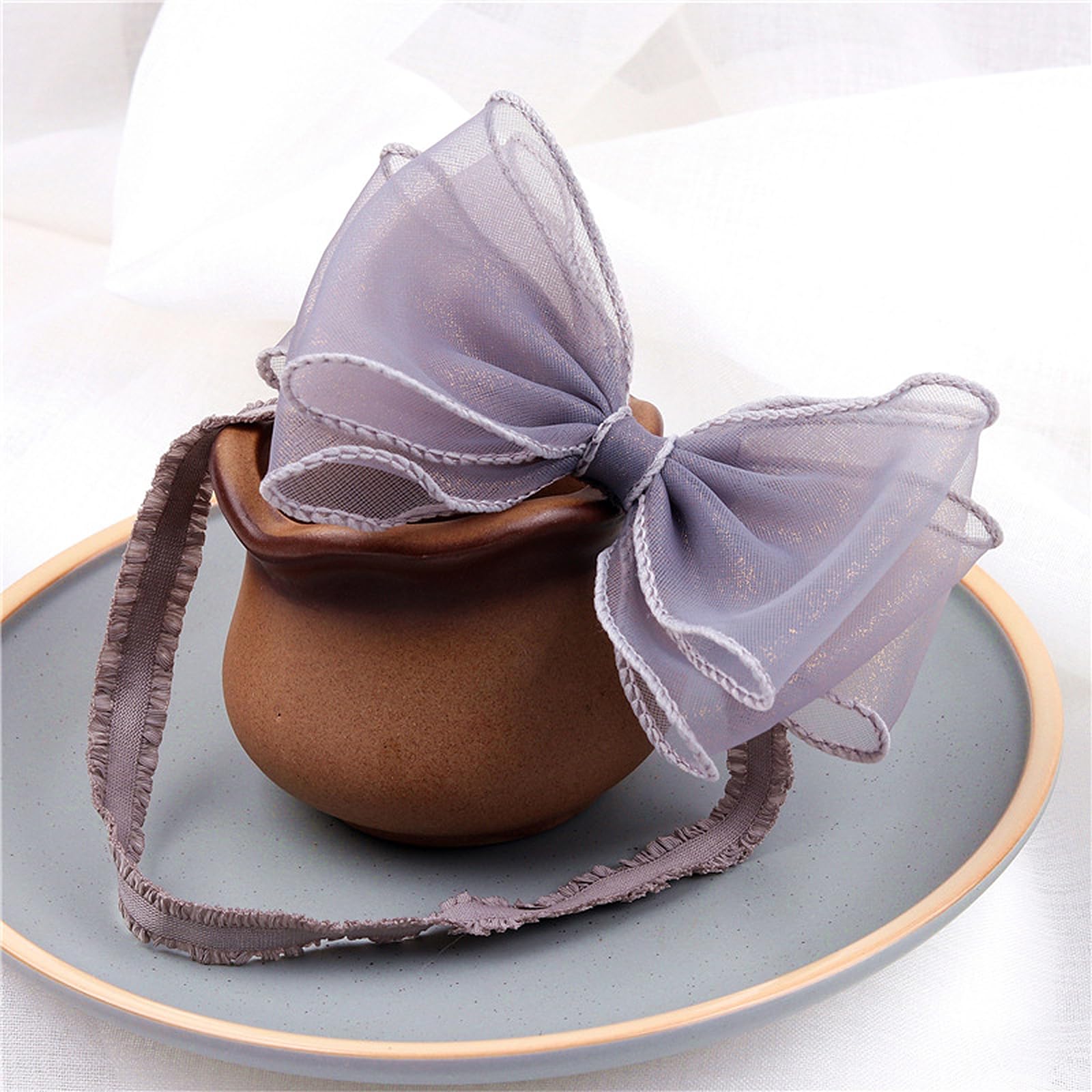 Rannyrena headband grey-a elastic showcases an adorable outfit accessory.