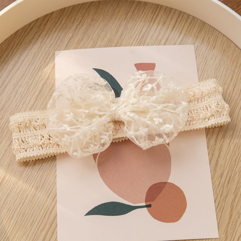 Rannyrena lace headband detailing enhances princess-style outfits for photoshoots.