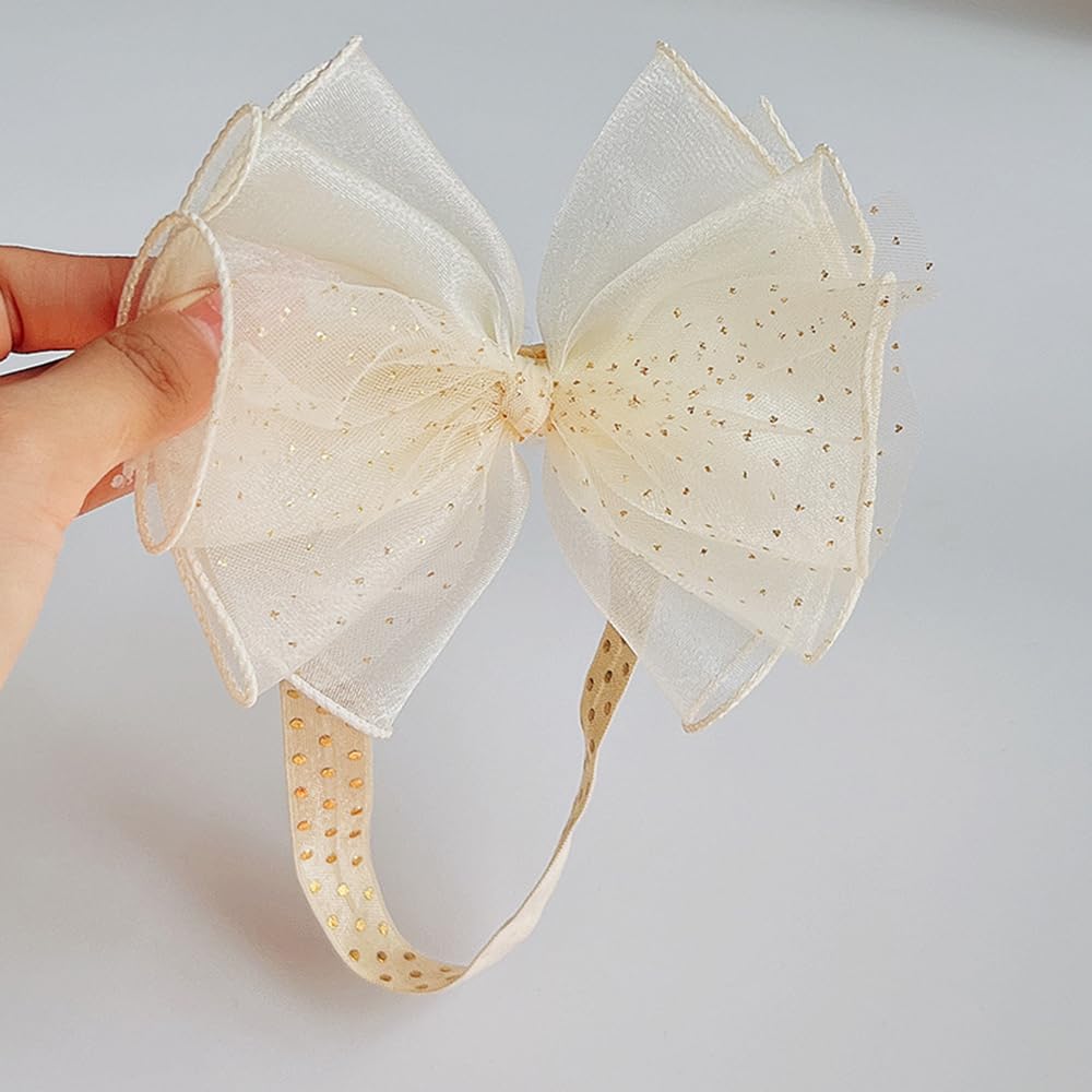 Rannyrena baby headband photographed during session, stretchy fit for 2-24 months.