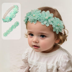 Rannyrena cyan lace flower headband closeup, soft stretch for secure comfort.