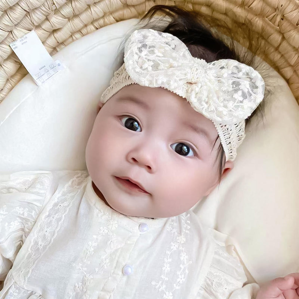 Rannyrena headband flatlay shows packaging and single-piece design.