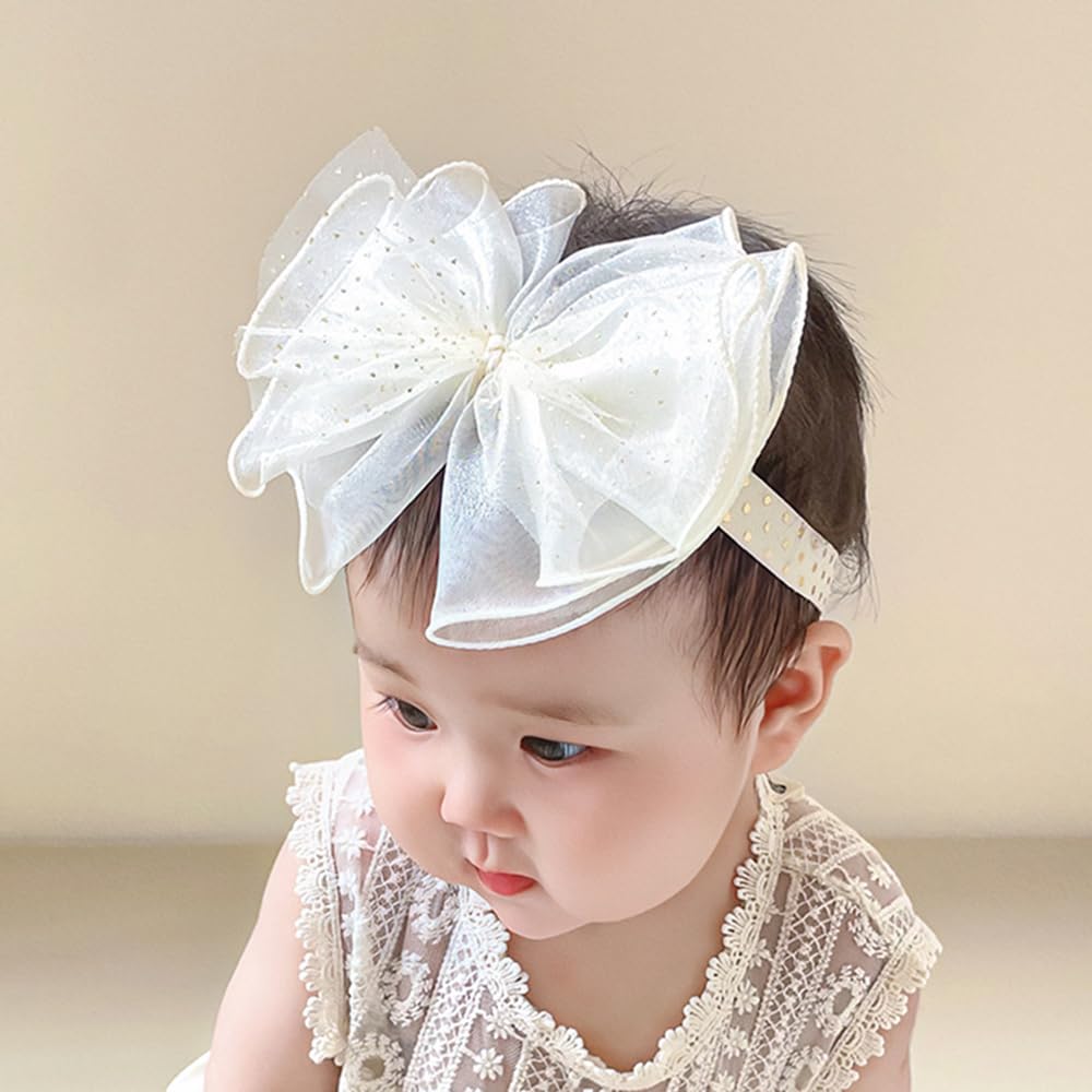 Rannyrena knotted ivory headband on baby, fashionable daily wear accessory.
