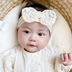 Rannyrena lace headband bow-knot ivory closeup ideal for special occasions.