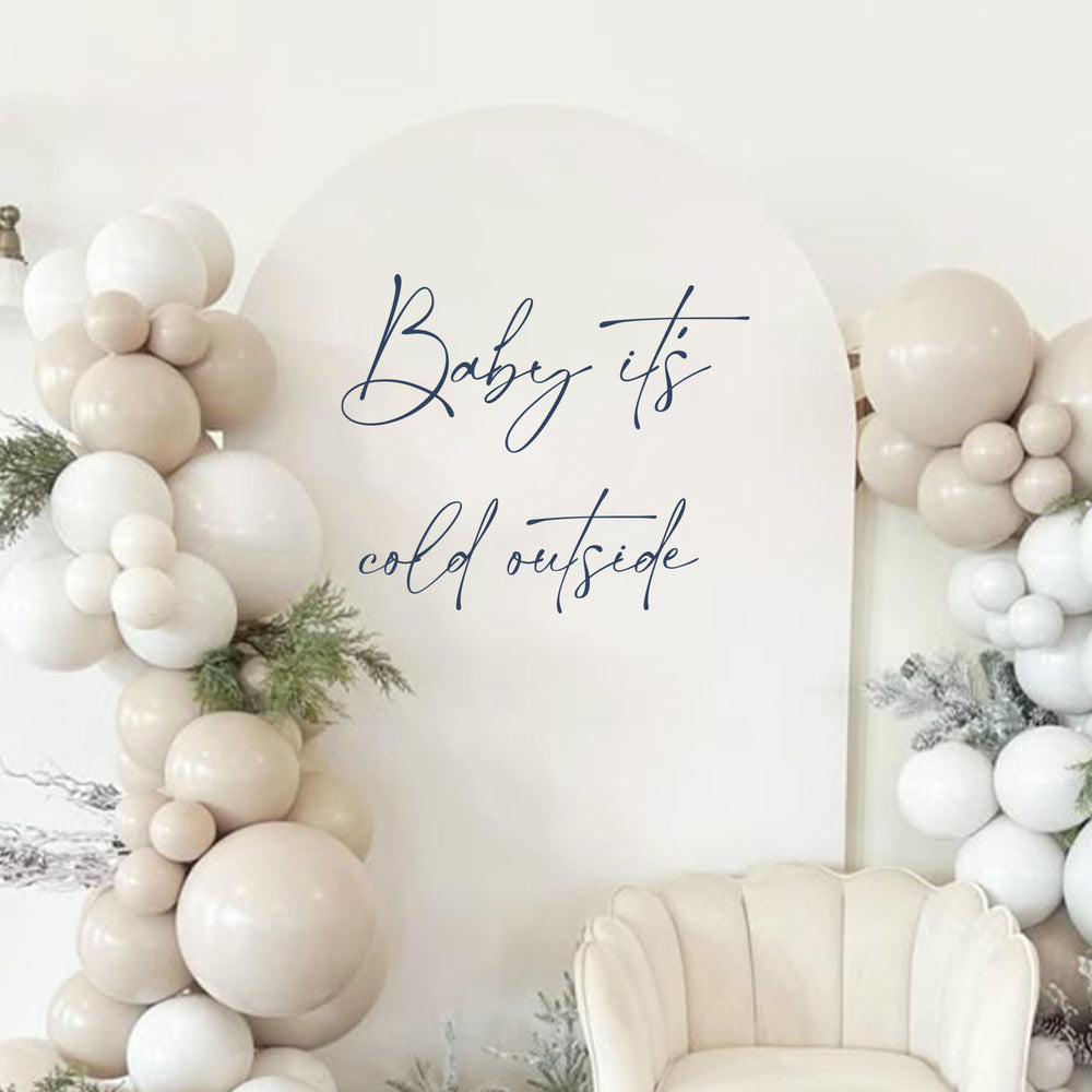Raoformi Baby It's Cold Outside wall decal — stylish winter backdrop for gender reveal celebrations.