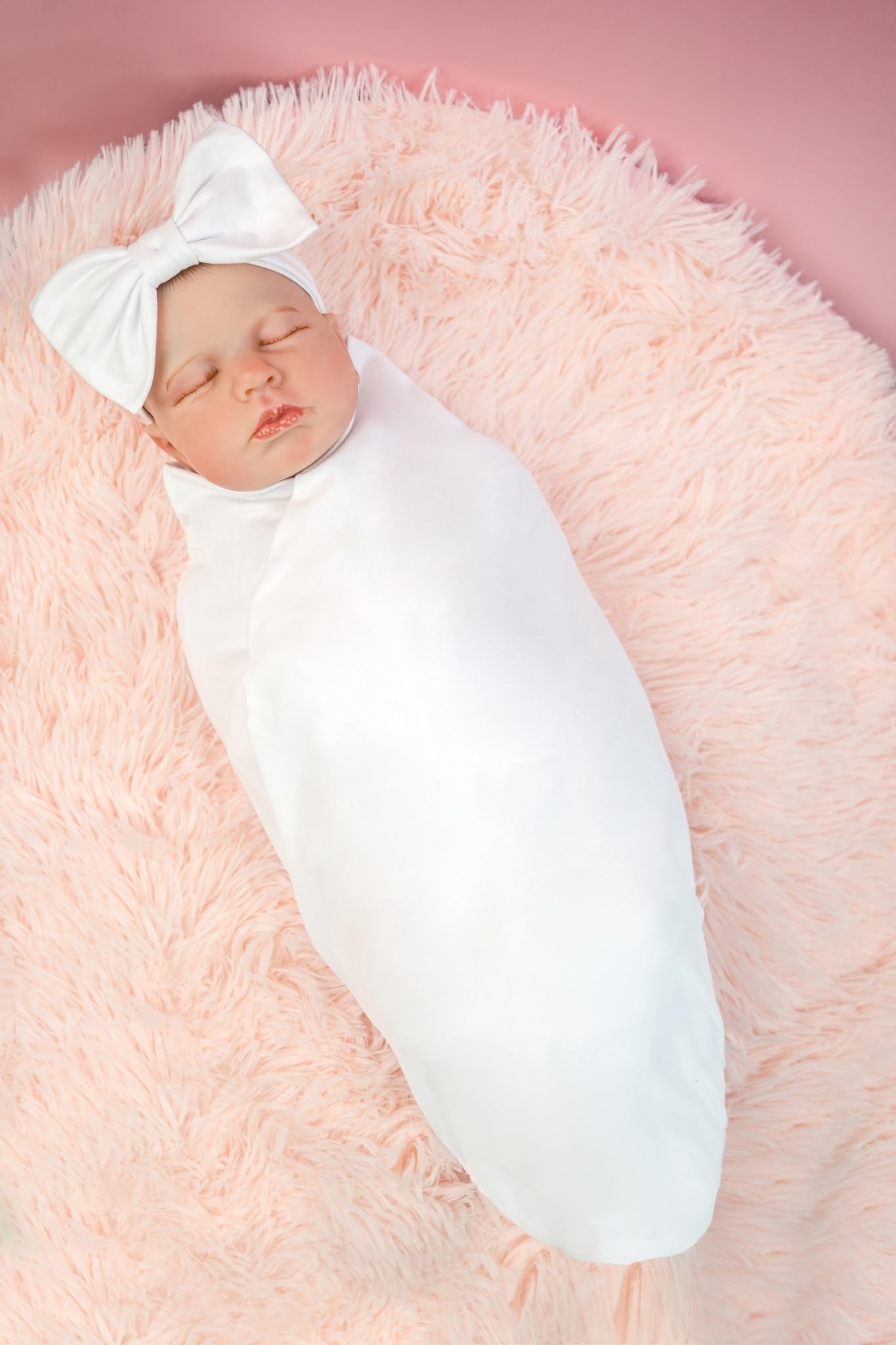 RATIVE swaddle blanket with headband cap white on baby provides calm comfort