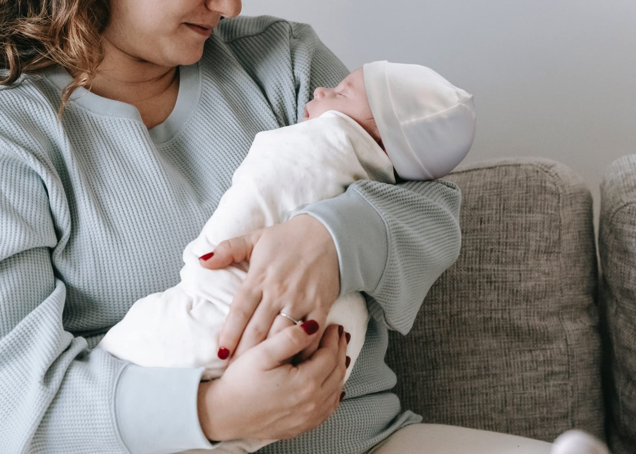 RATIVE swaddle blanket demonstrates warmth and soft comfort for cozy naps