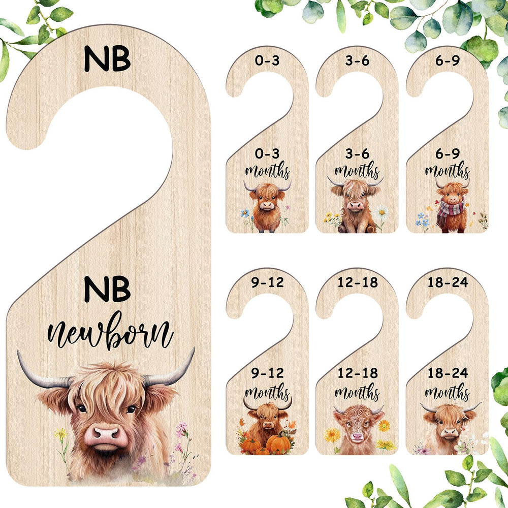 RattanView Highland Cow 7pc set front view shows organized baby wardrobe with colorful sorting