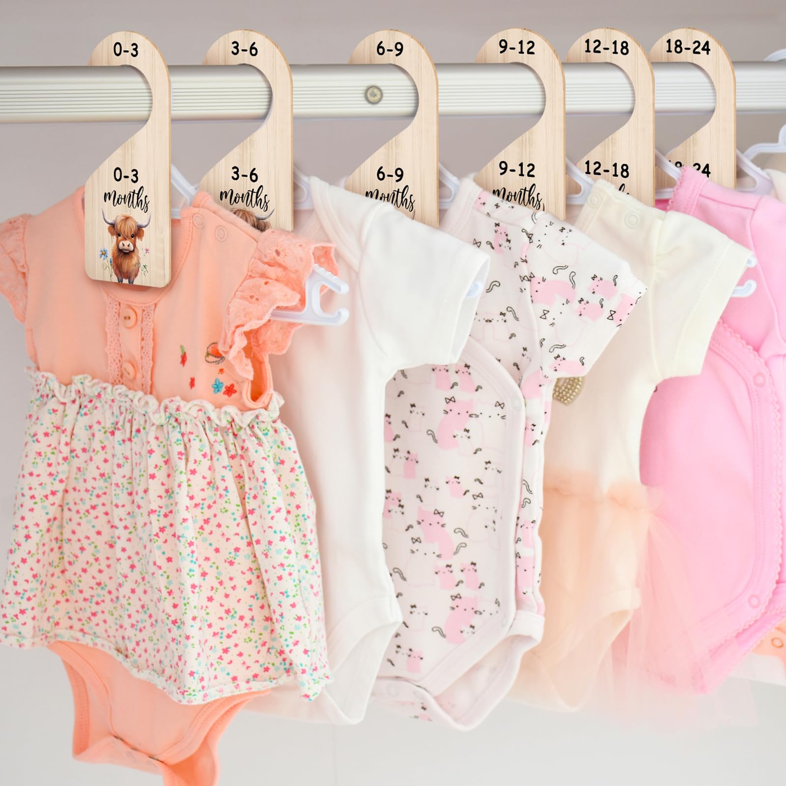RattanView wardrobe display on rod demonstrates easy sorting by age range