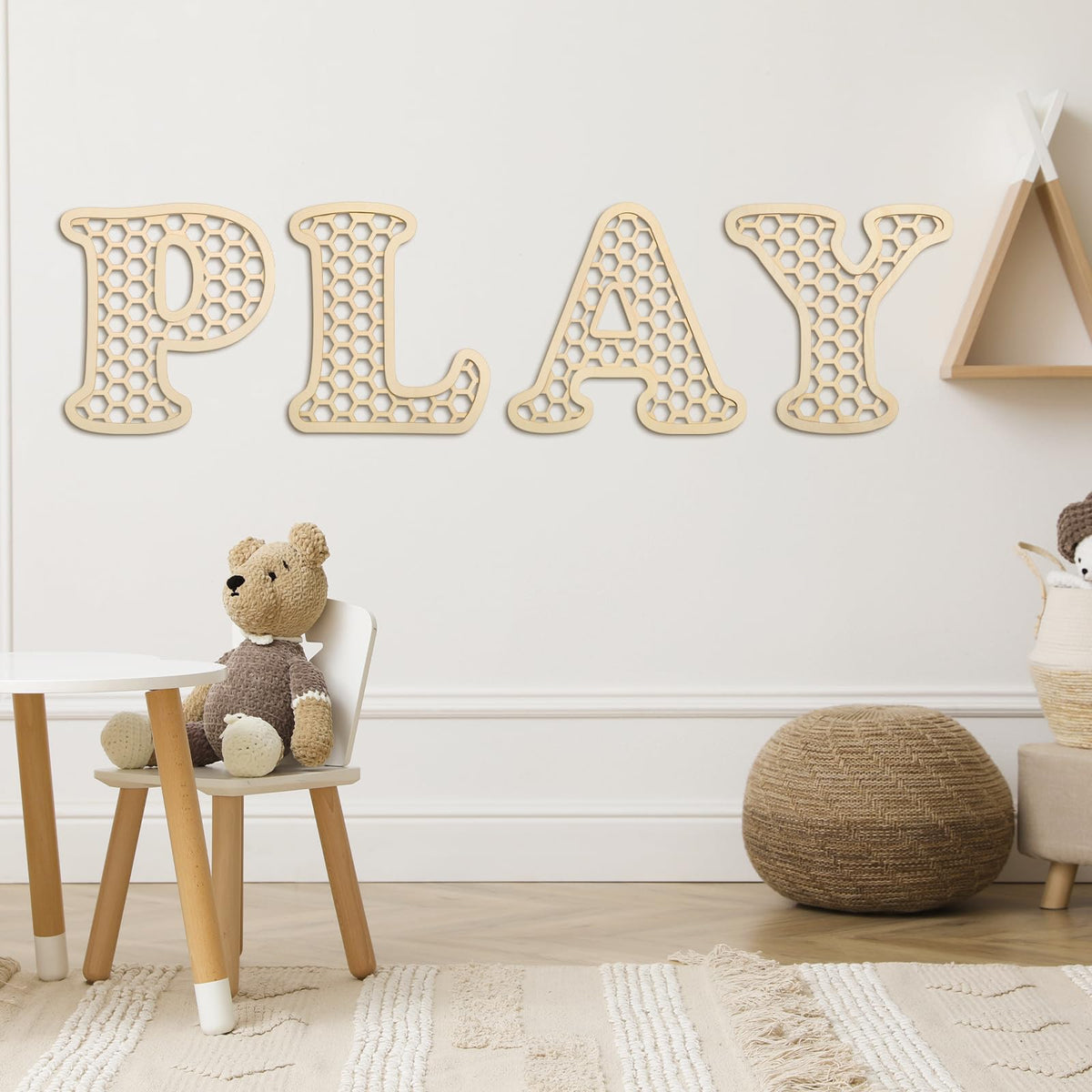 RattanView wooden play letters set on wall display for cozy playroom decor.