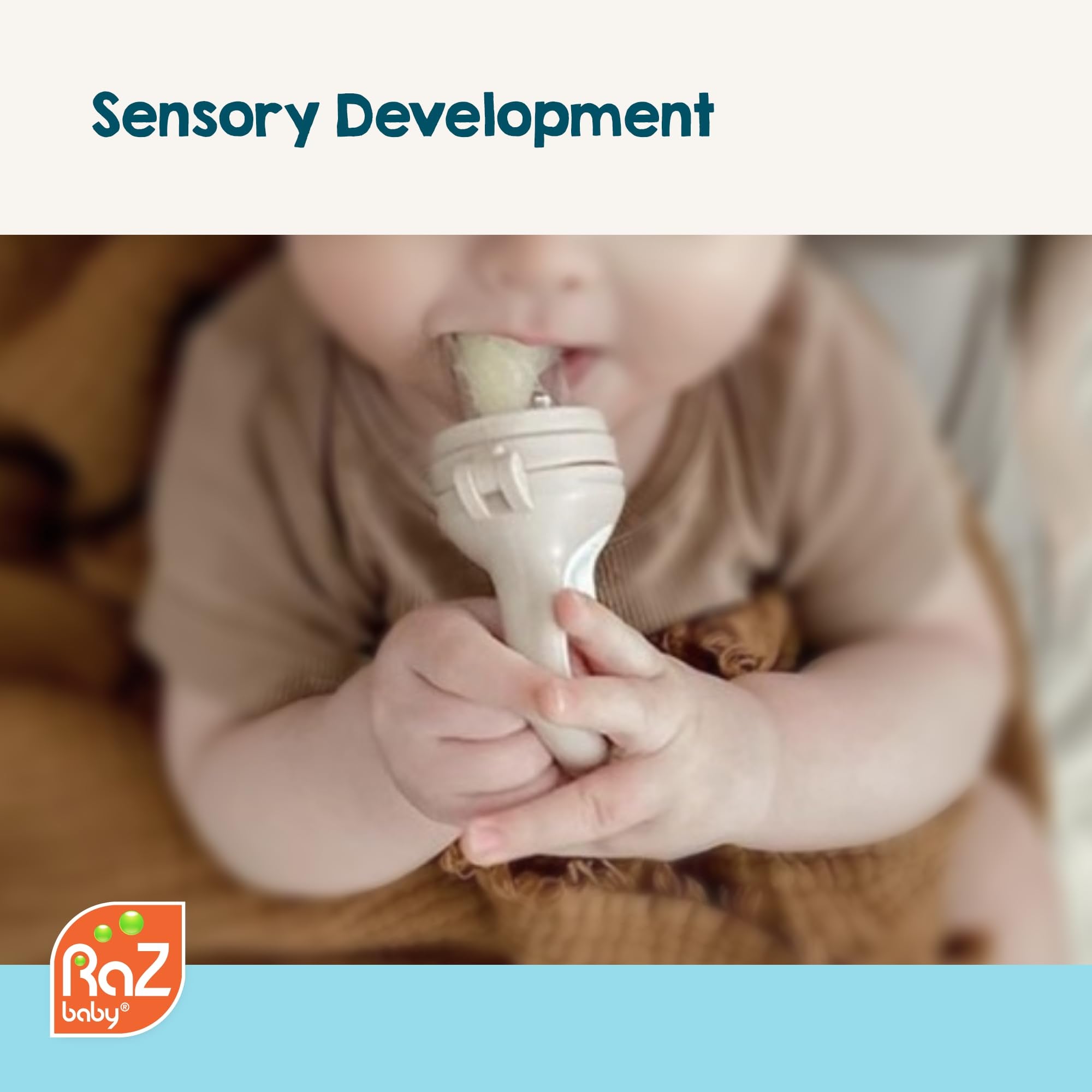 RaZbaby baby holding the feeder demonstrates easy grip for little hands.