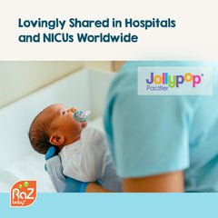RaZbaby JollyPop holder dragon demonstrates easy pacifier swapping.