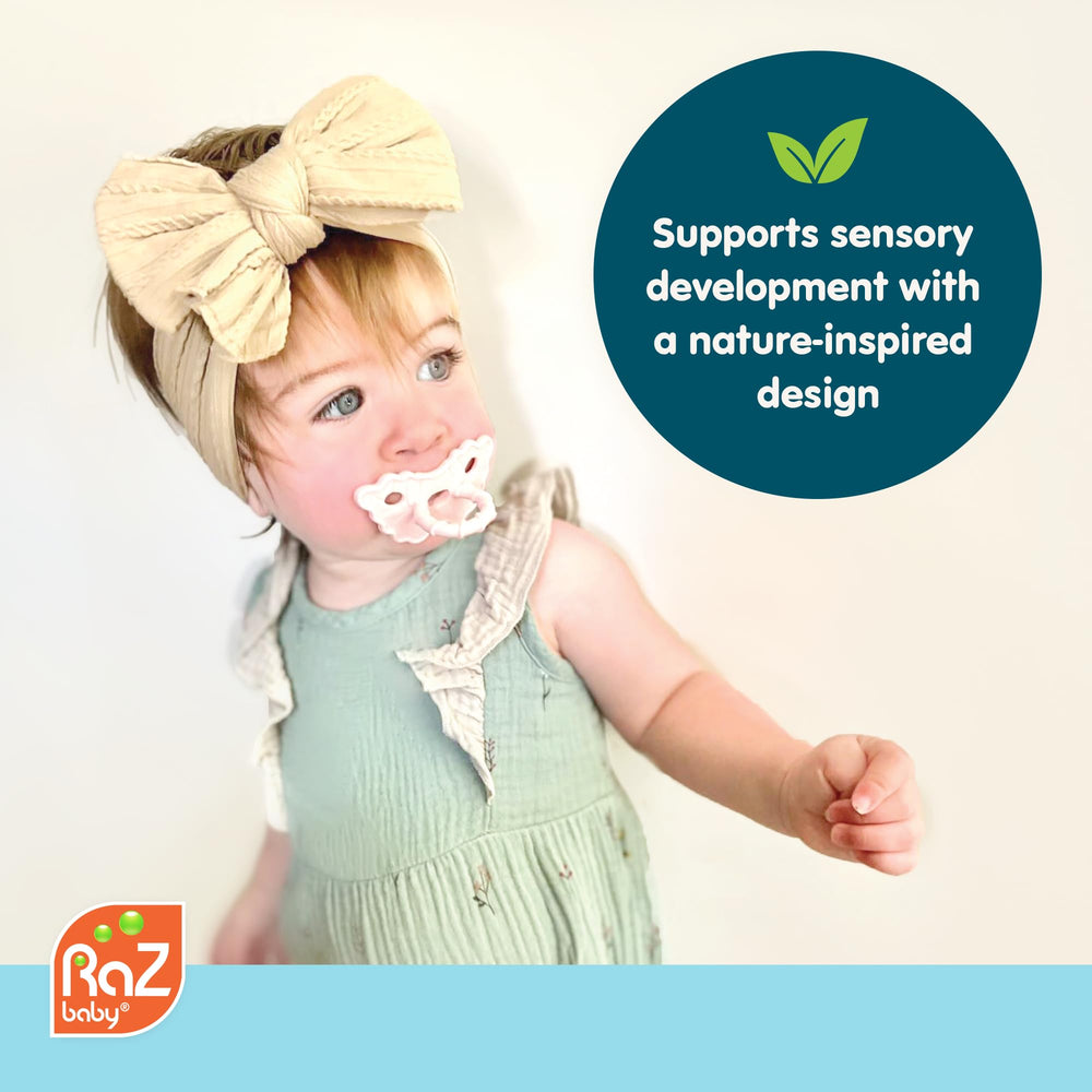 RaZbaby RaZberry pacifier-teether supports hands-free soothing on the go.
