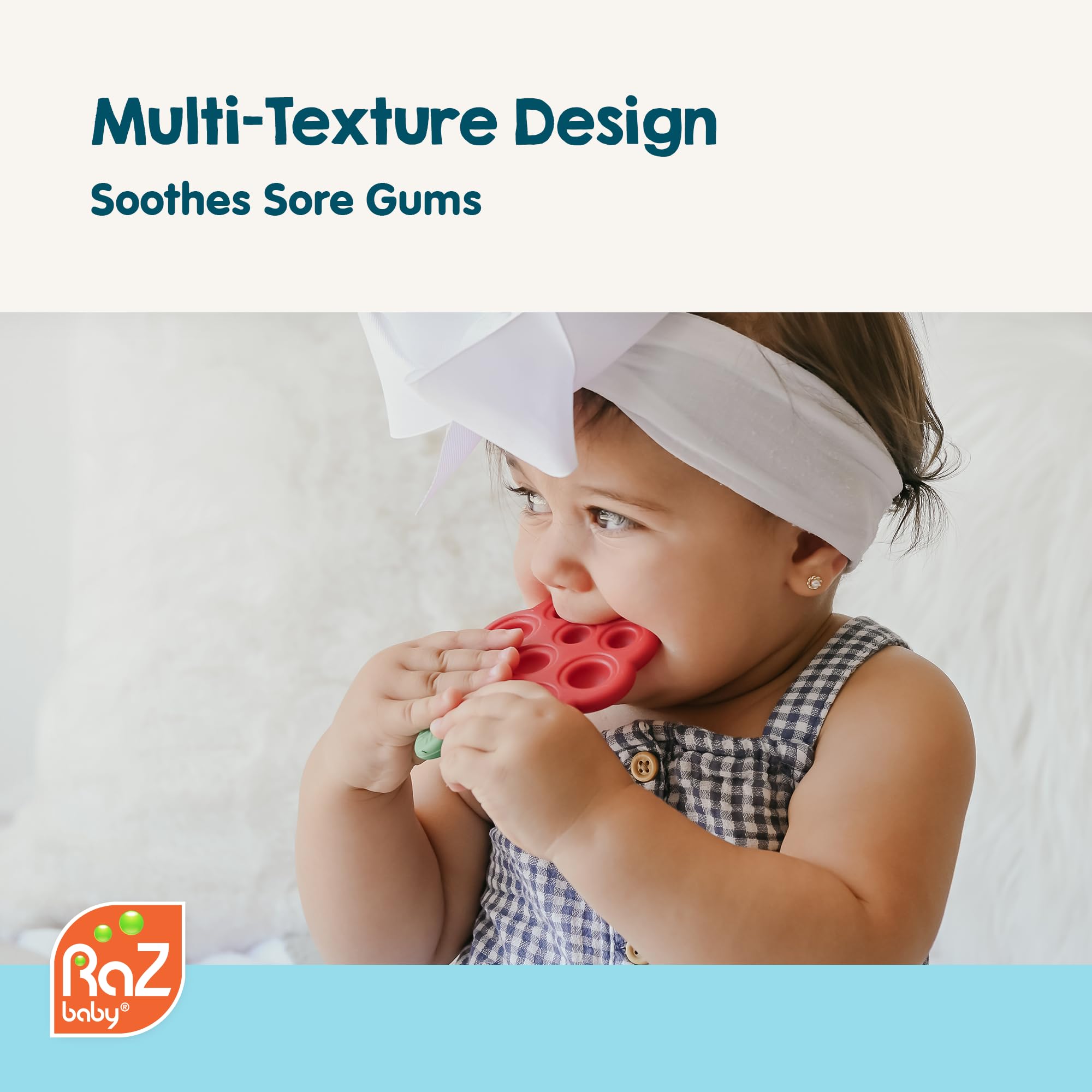 RaZbaby Razberry Pop teether close-up shows multi-texture silicone for soothing gums