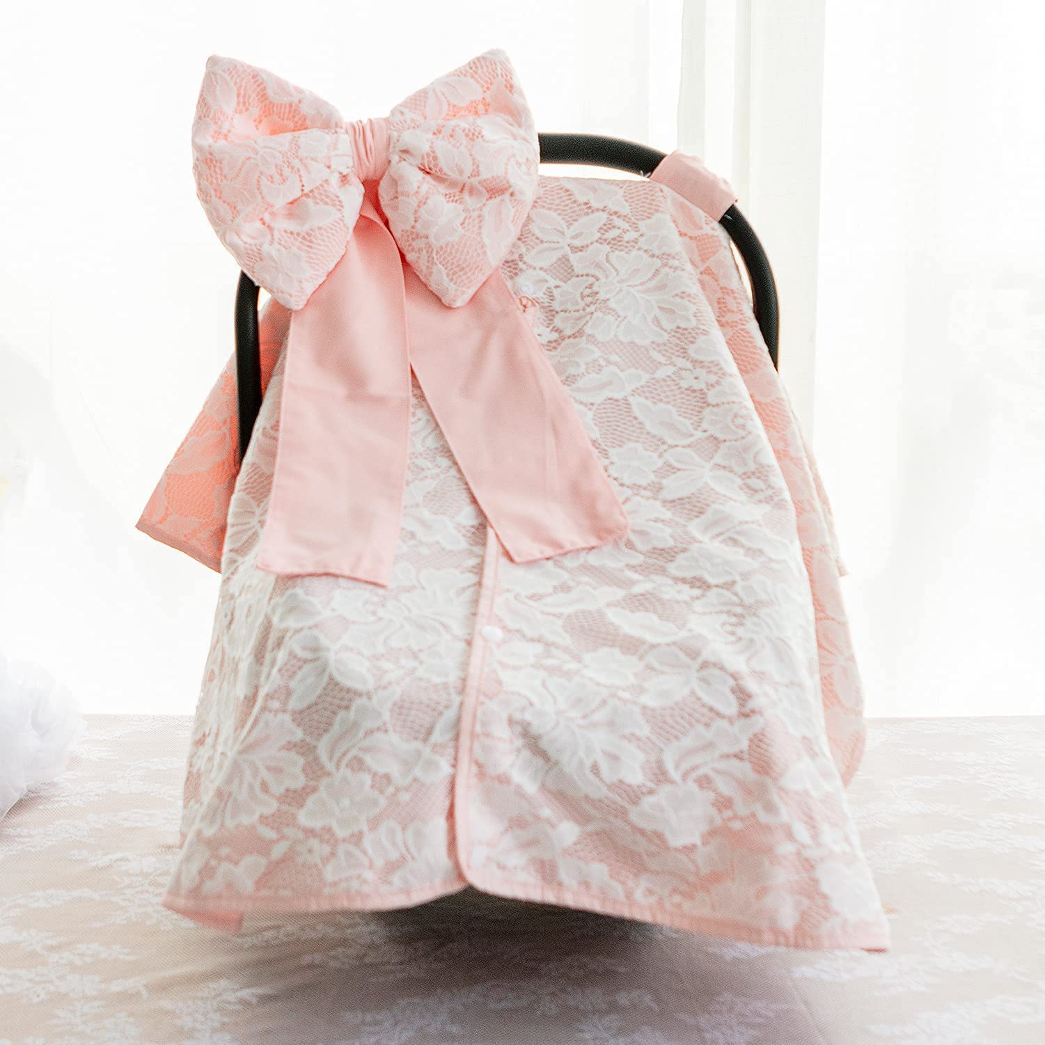 Razee car-seat canopy cover bow on stroller full view highlights cute stitching and sun protection.