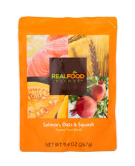 Real Food Blends salmon-oats-squash-puree pour—smooth stream suitable for gravity or pump delivery.