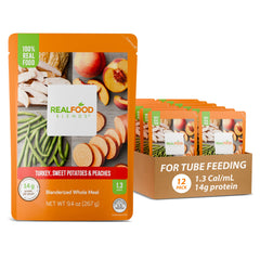 Real Food Blends turkey-sweet-potatoes-peaches puree in bowl ready for tube feeding.