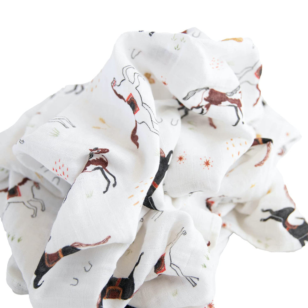 Red Rovr Howdy Horse nursery scene, cozy naps with breathable muslin.