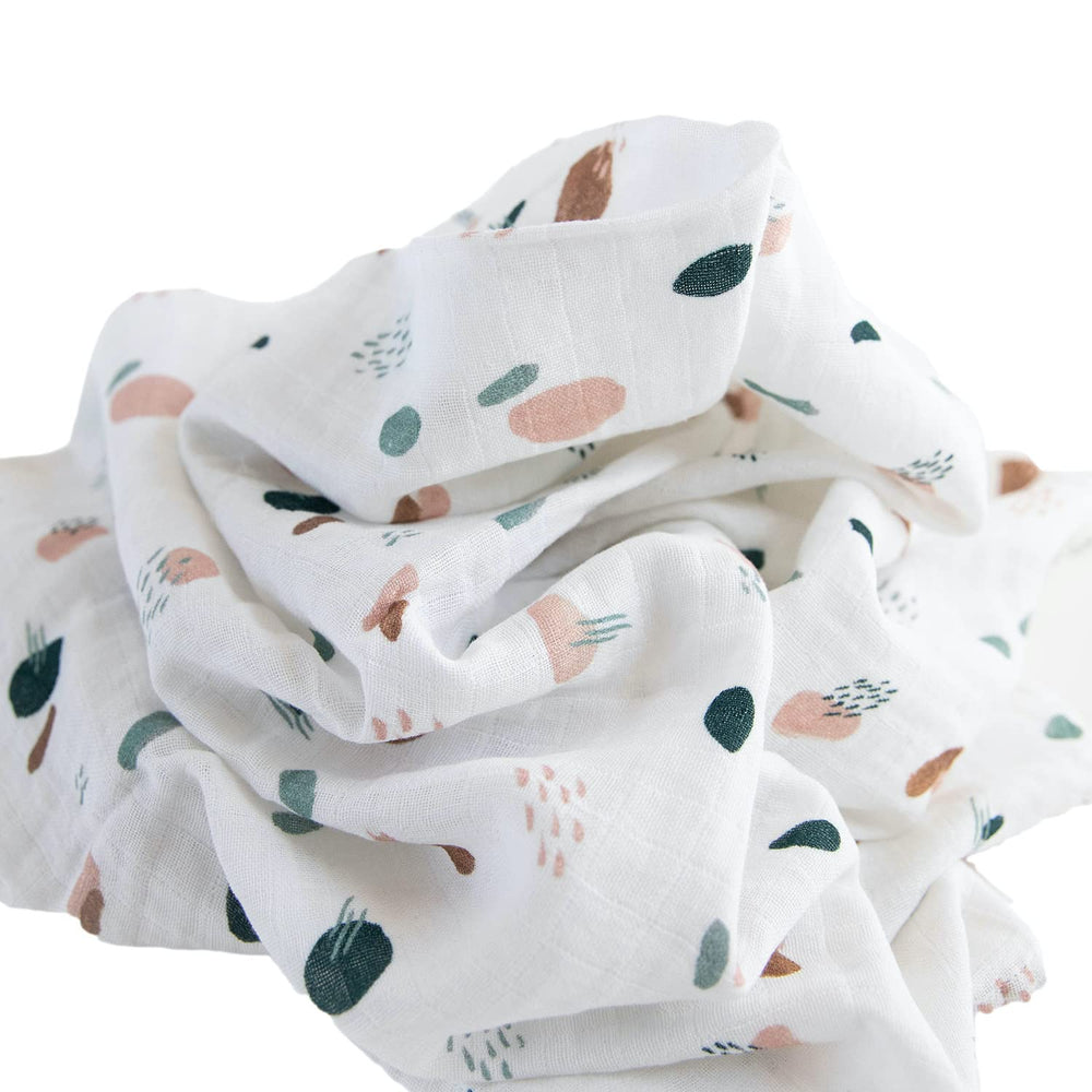 Red Rovr 44x44 swaddle size shown for travel and cuddles.