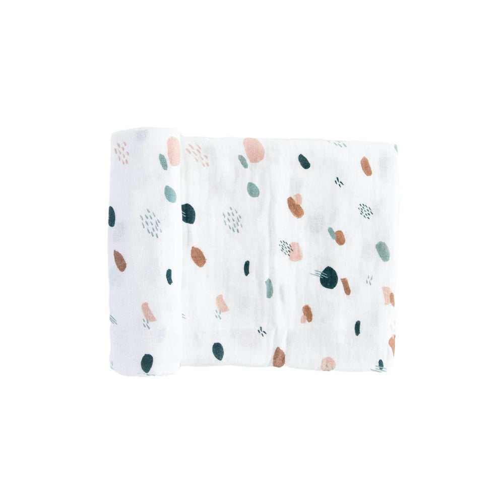 Red Rovr dots-dashes swaddle spread highlighting breathable muslin for daily cuddles.
