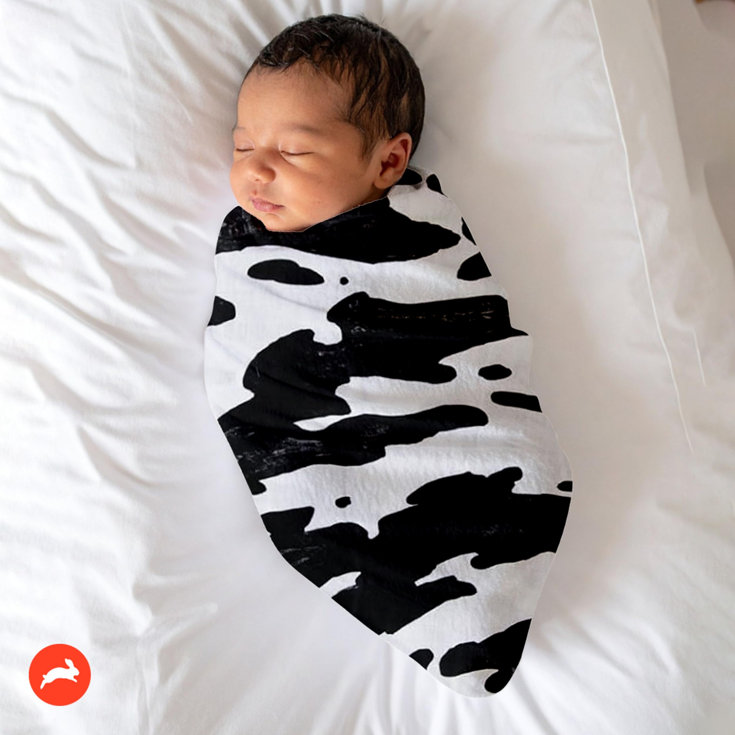 RED ROVR Organic cotton muslin fabric close-up, breathable and gentle on baby skin.