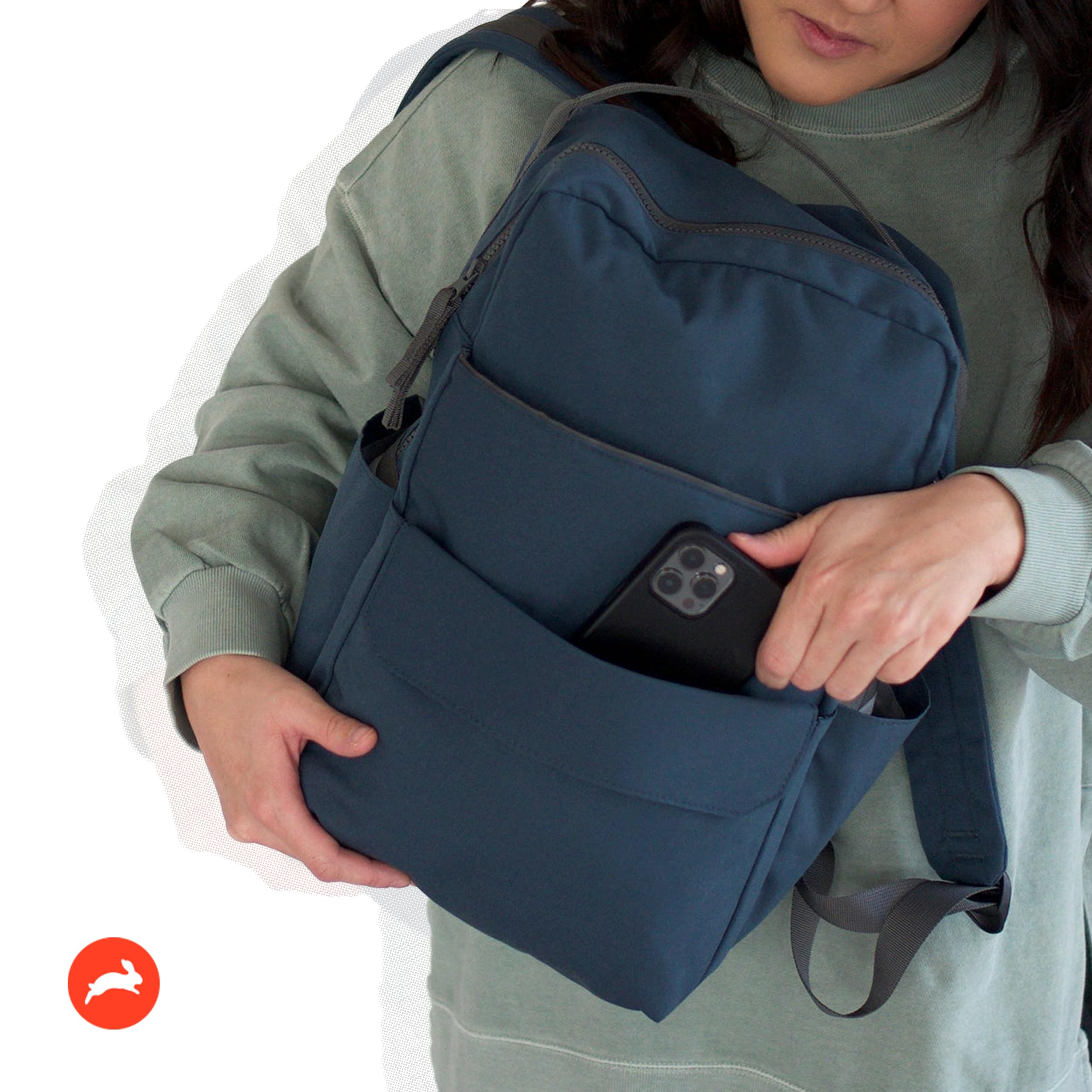 Red Rovr Roo backpack side pocket with bottle space for large drinks.
