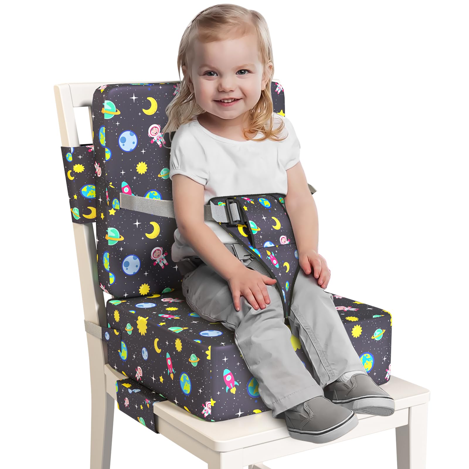 Redcoutt booster seat on dining chair with extended straps for secure fit.