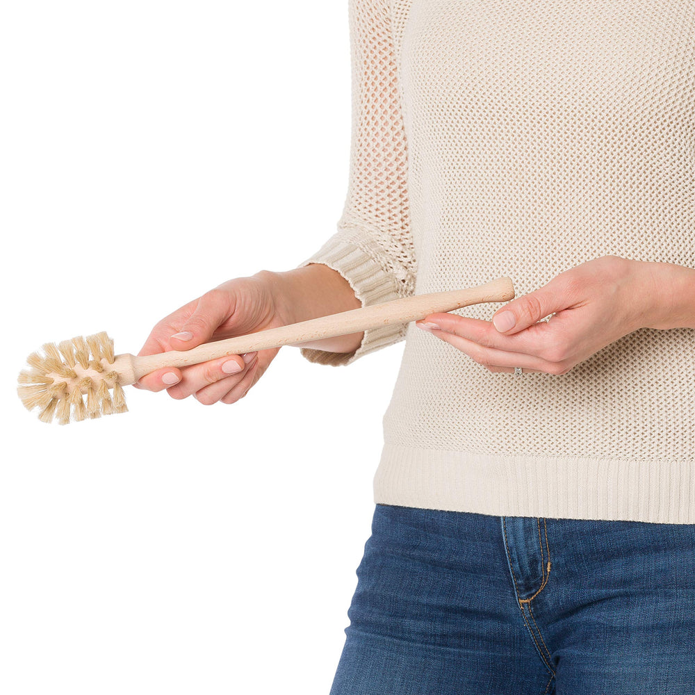 Redecker bottle brush highlights German craftsmanship in durable wooden design.
