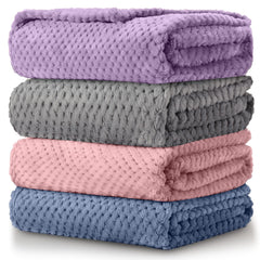 Reginary 4-pack fuzzy blankets in assorted colors for nursery warmth.