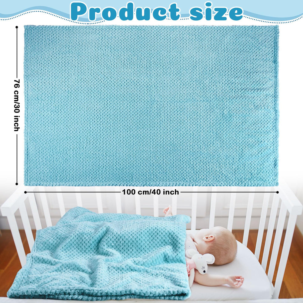 Reginary light-blue waffle-pattern blanket highlights textured warmth for nursery decor