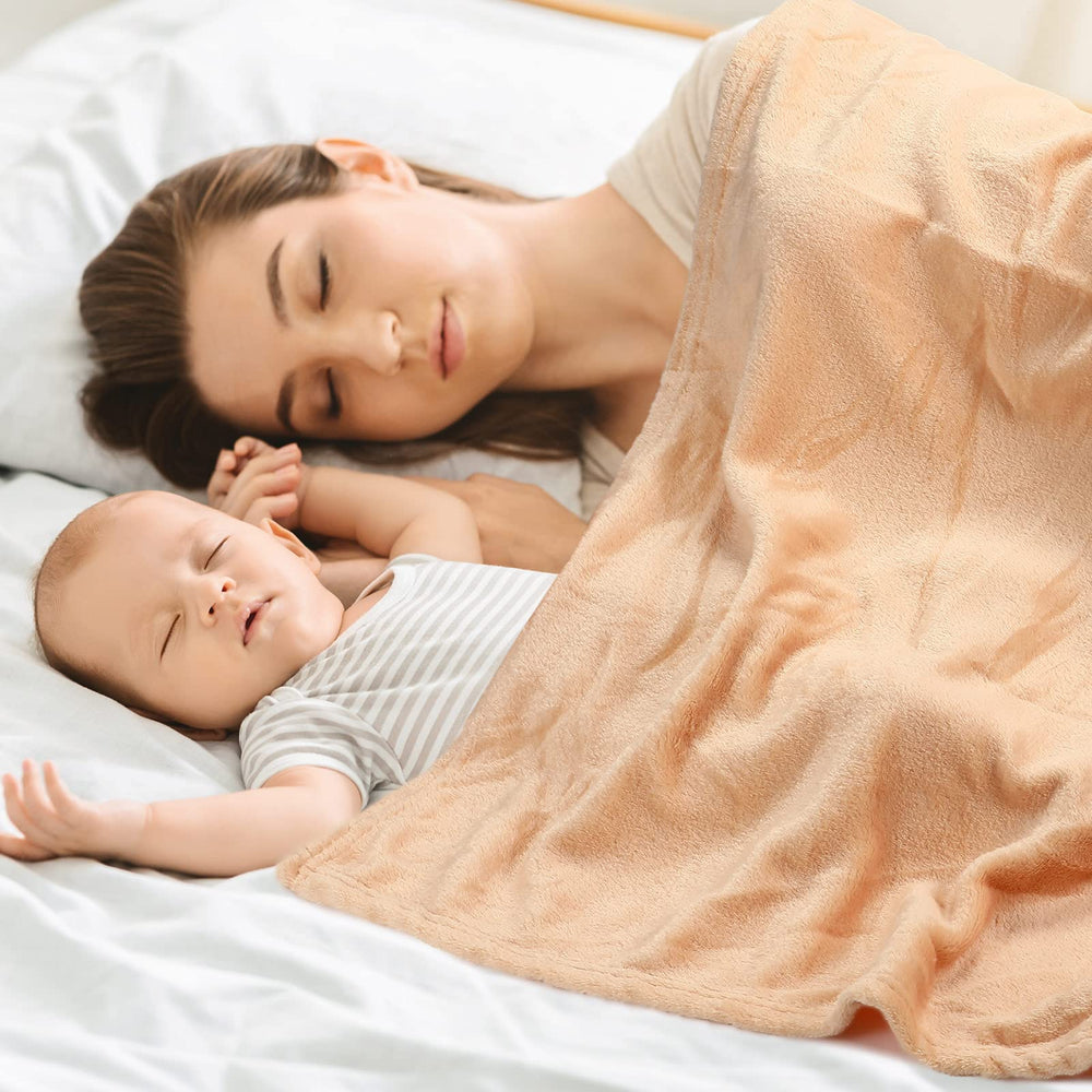Reginary 30x40 inch blankets shown with easy-care machine washing features.