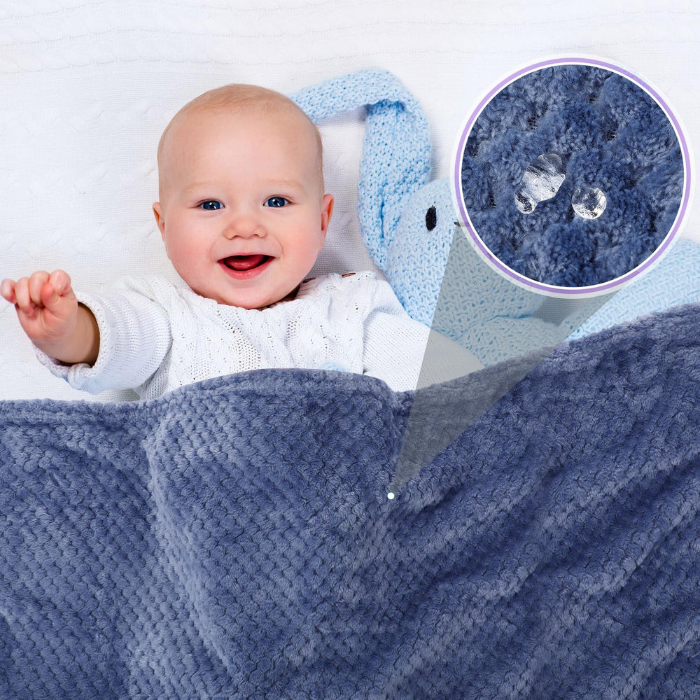 Reginary waffle coral fleece blanket in blue providing soft, breathable warmth.
