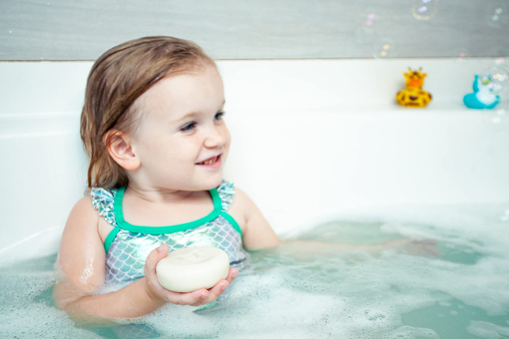Relaxcation Organic Unscented Baby Soap Bar newborn skin care demonstrates softness.