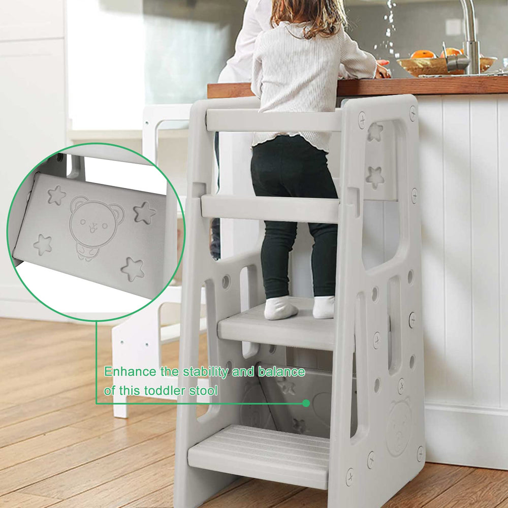 Reliancer Toddler climbs onto the stool with confident posture